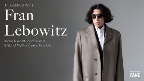 Fran Lebowitz in person wearing a light jacket