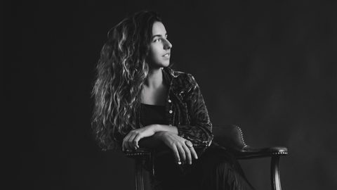 Sofia Rosa sat on a chair