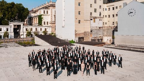 BRNO Philharmonic orchestra members stood outside on a public square