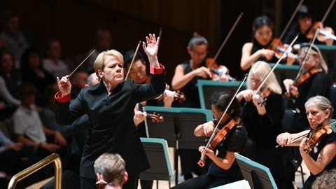Marin Alsop conducting on stage